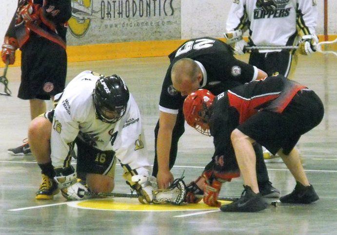 A box lacrosse faceoff