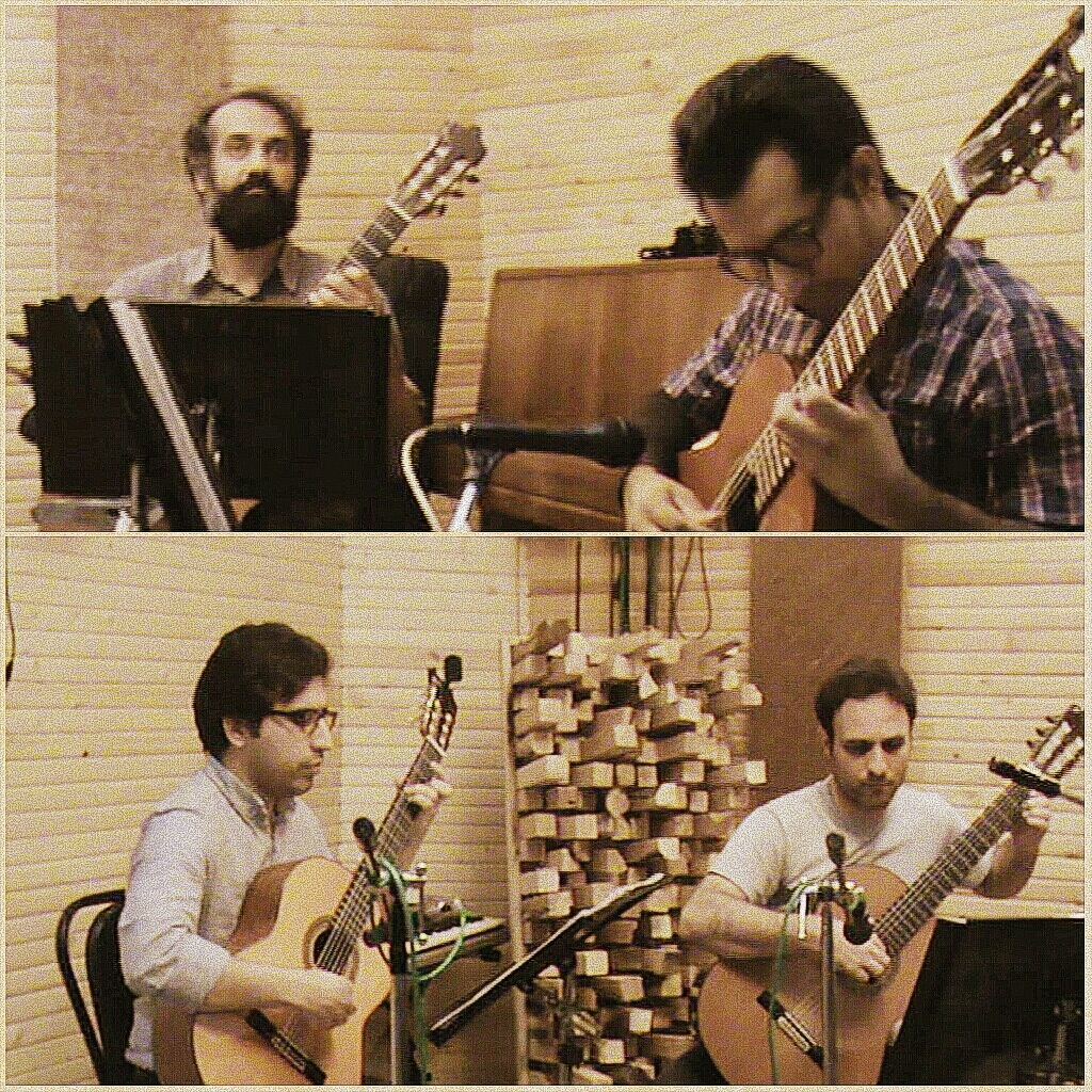 A group of guitarists performing together